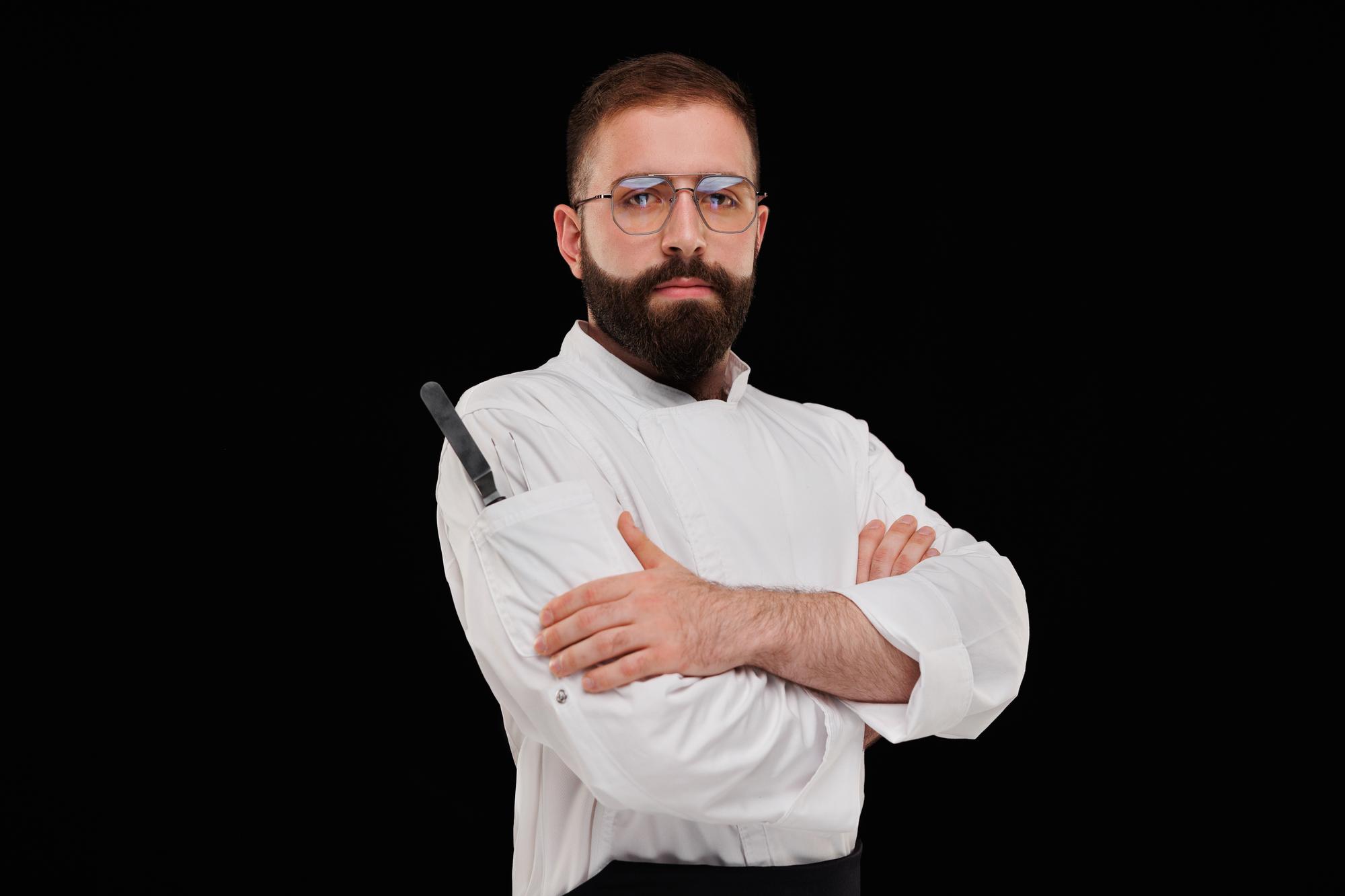 Head chef portrait with folded arms